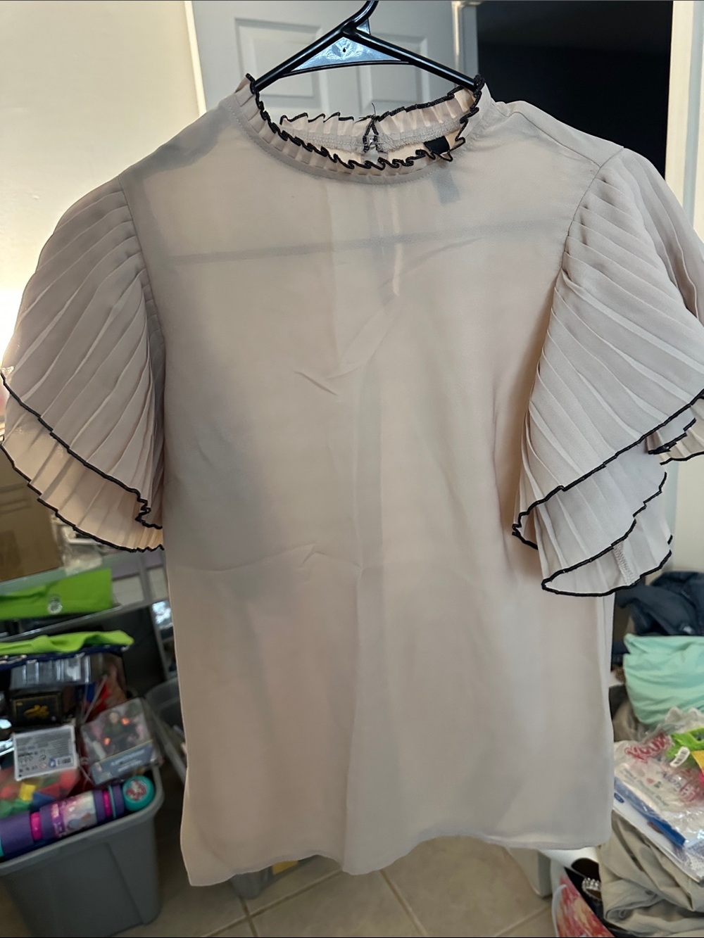 Ruffled Short-Sleeve Blouse in Cream with Black Trim